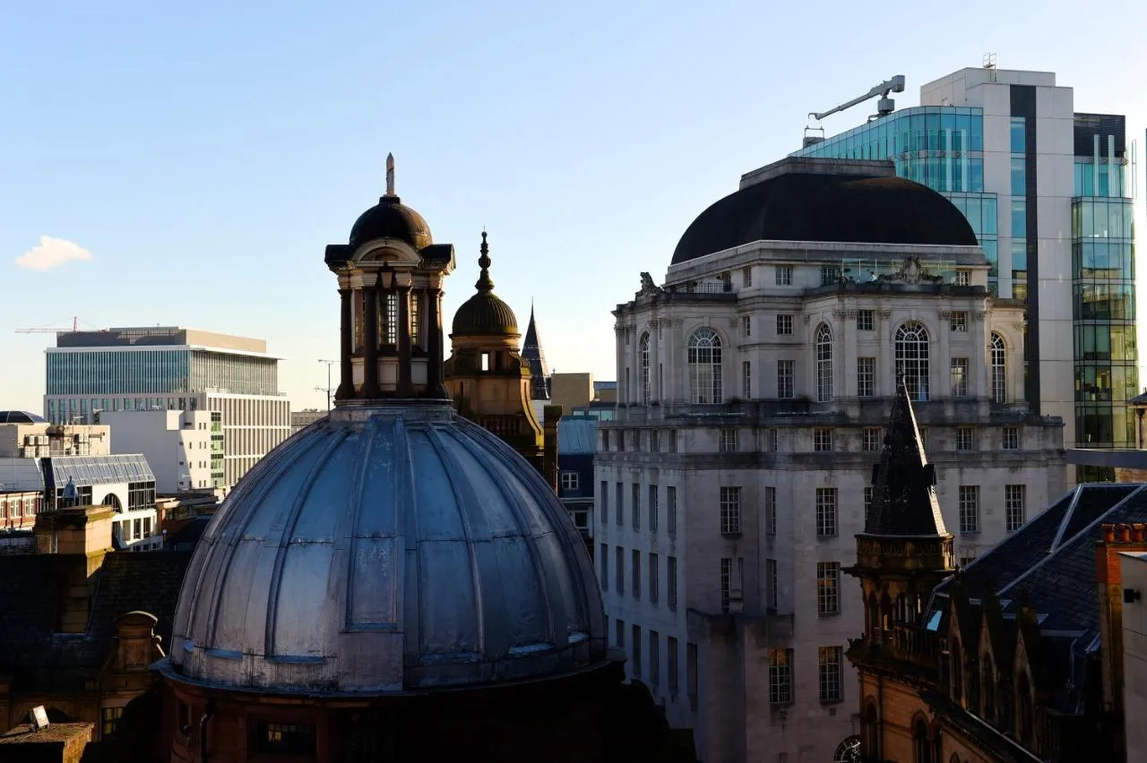 a group of buildings in a city with at The Rex - formerly Hotel Gotham in Manchester